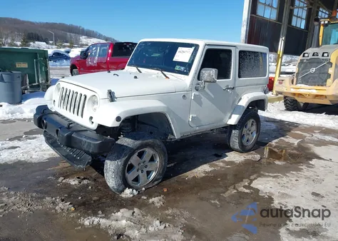 2011 Jeep Wrangler Sport z USA, uszkodzony, nr VIN 1J4GA2D13BL501499